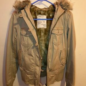 Warm tan utility jacket.